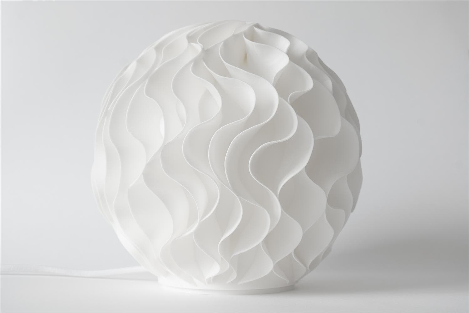 Leora Growth Sculpted Lamp — CTA